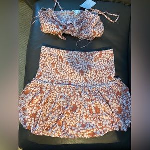 Lovely blush skirt set and top. Never worn too small for me.